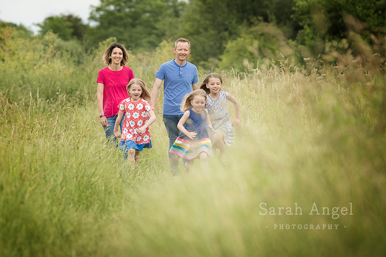 The O'Hare family take a short break from their busy weekend for their Photo Shoot in the meadows near St Andrew's Church in Farmham.