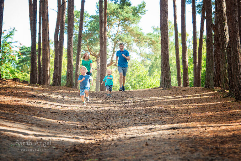 Having fune at their family photo shoot in Frensham Surrey