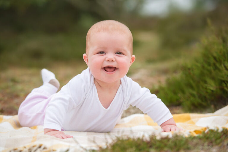 All smiles! Here is another option for the best age for newborn photography and older baby photoshoots.